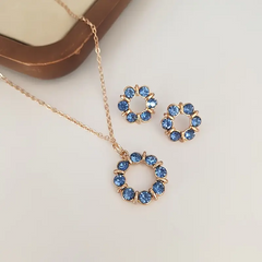 Eternal Grace: 14K Gold-Plated Circle Pendant Necklace and Earrings Set with Synthetic June Birthstone